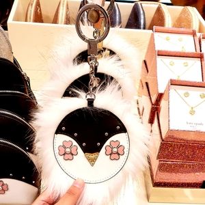 KATE SPADE BLACK KEY FOBS IN PENGUIN DESIGN